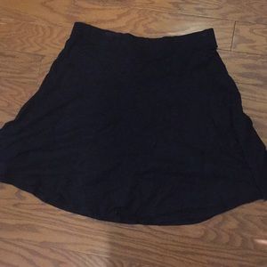 Black flare out shirt.